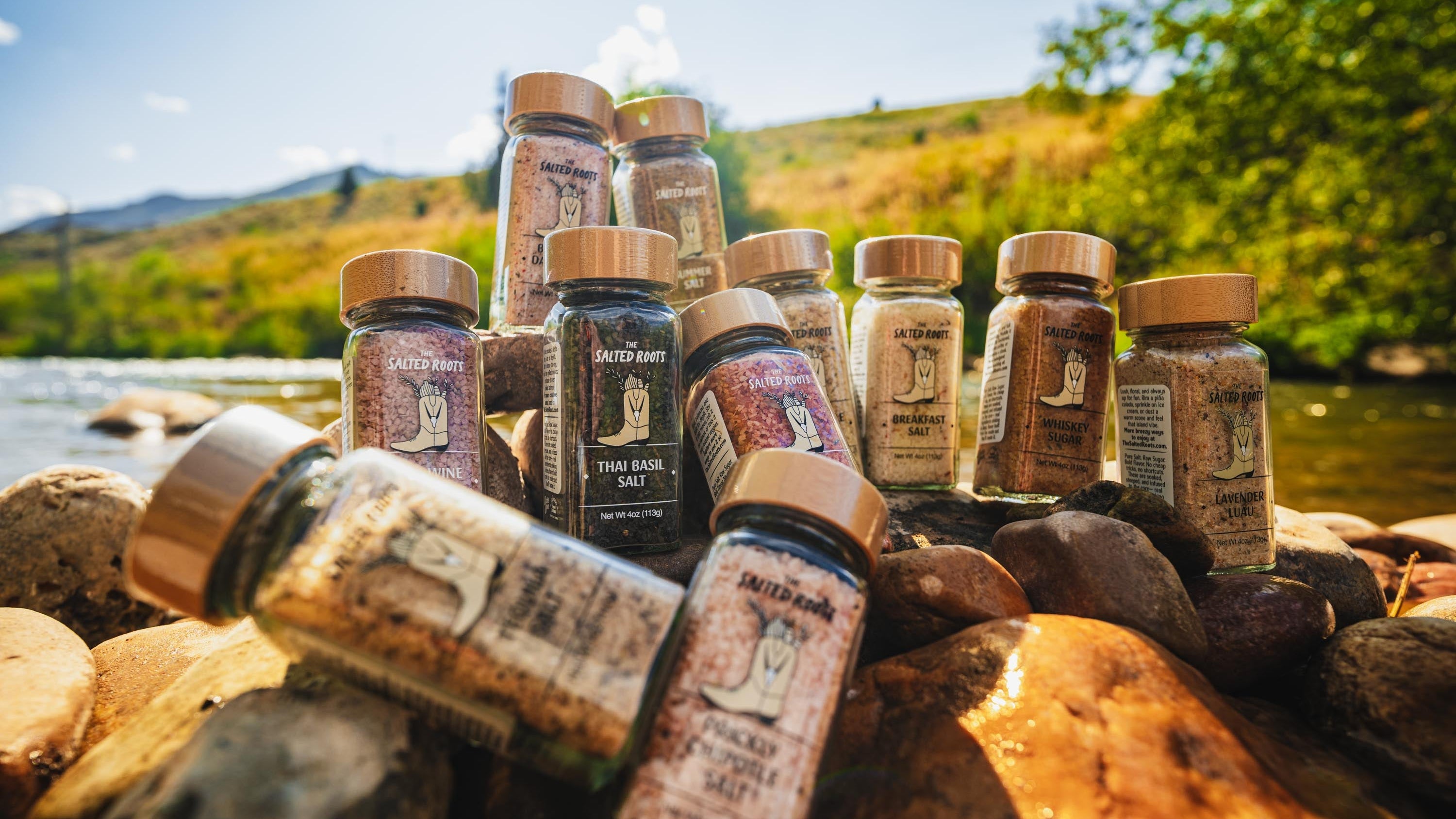 Jars of salt on rocks in a river